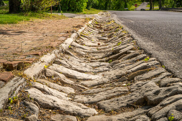 street drain paved with rock in historic town of Arrow Rock, MIssouri - 795730274