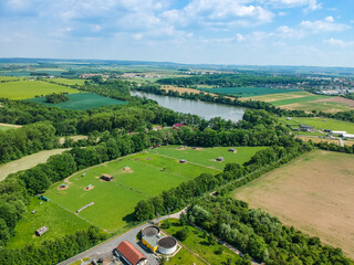 Fototapeta na wymiar Aerial view of Podlesky pond in Uhrineves in Summer, Prague, Czech republic