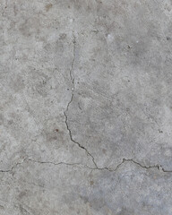 Textures of old concrete. Gray damaged concrete background, wall, old slabs. Top view, close-up.