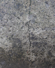 Textures of old concrete. Gray damaged concrete background, wall, old slabs. Top view, close-up.