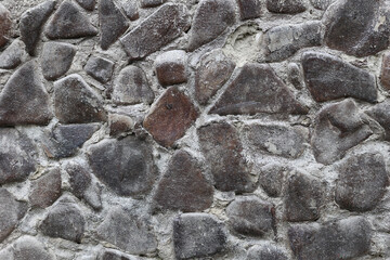 Stone background, stone wall, texture. Up close Masonry in the old style