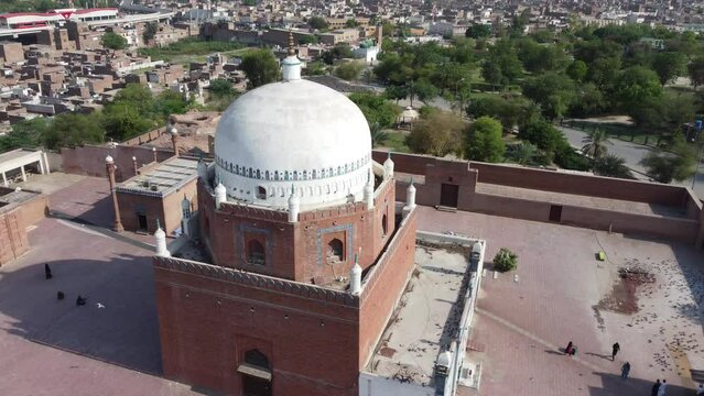 Ariel or Drone View of Multan Darbar Hazrat Bahauddin Zakariya Multani Tomb. Multan Picturesque Breathtaking View of Hazrat Bahauddin Zakariya Tomb on a Sunny Blue Sky Day. Drone View 4K