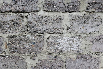 Textures of old concrete. Gray damaged concrete background, wall, old slabs. Top view, close-up.