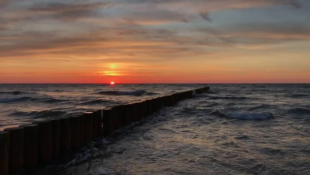 Sunset Horizon over Choppy Sea Waves