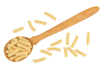 Italian spiral shaped pasta, Fusilli bucati macaroni in wooden spoon, isolated on white background. Top view. Flat lay.