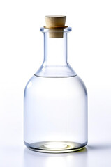 Glass bottle with clear alcoholic, non-alcoholic liquid, water, alcohol with cork stopper on light background