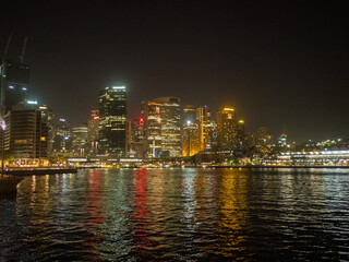 Sydney CBD skyscrapers reflected in the water at night