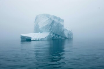 foggy glacial iceberg in cold arctic sea atmospheric landscape photo