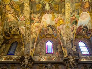 Fototapeta na wymiar St Nicolas de Bari and St Pedro Martir Church fresco covered ceiling