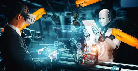 MLB Mechanized industry robot and human worker working together in future factory. Concept of...