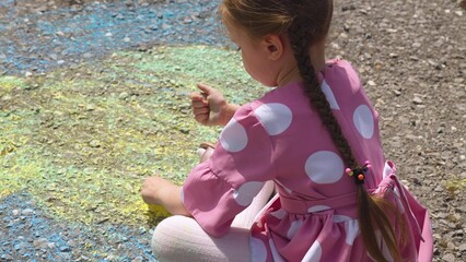child hand drawing chalk asphalt, child kid childhood dream, little artist playground park girl...