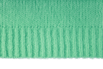 Green knitted woolen jersey fabric, sweater, pullover texture with edge isolated on white, transparent background. Fabric abstract backdrop, cloth wallpaper