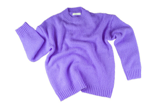 Purple flying crumpled women's autumn knitted sweater isolated on white, transparent background. Creative clothing concept, trendy cozy creasy jersey pullover. Fashion, sale, autumn discount
