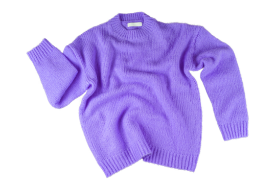 Purple flying crumpled women's autumn knitted sweater isolated on white, transparent background. Creative clothing concept, trendy cozy creasy jersey pullover. Fashion, sale, autumn discount