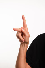 Close-up of a hand making the letter K in the sign language for the deaf in Brazil, Libras.