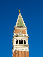 Fototapeta na wymiar San Marco Tower top with Justice allegory, Venice