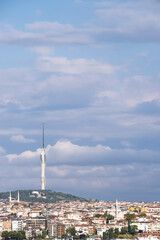 istanbul communications tower, Camlica tower, with residential houses underneath, copy space, vertical