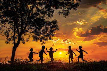 Children playing under the tree with sunset view
