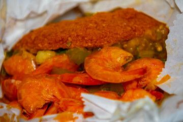 Traditional Brazilian acarajé, food of African origin based on vatapá, caruru and dry shrimp 