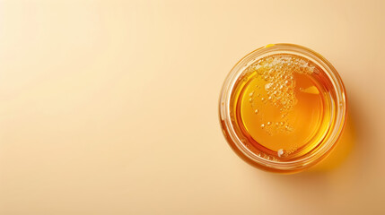 pure honey top view in clear jar for culinary design and natural product promotion, with copy space for text