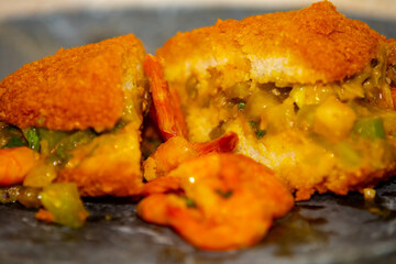 Traditional Brazilian acarajé, food of African origin based on vatapá, caruru and dry shrimp 