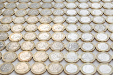 One euro coins on white background