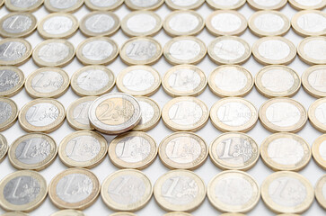 One euro coins on white background