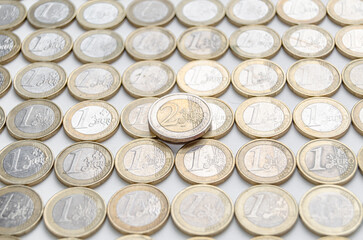 One euro coins on white background