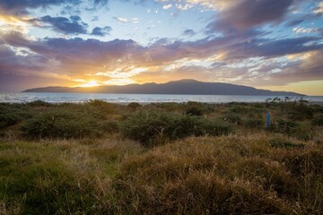 Sunset over Kapiti Island. Paraparaumu Beach, Paraparaumu, Wellington, New Zealand.