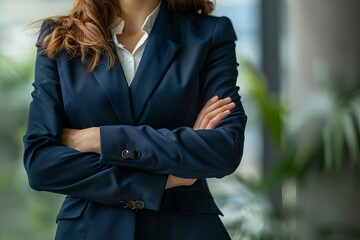 Successful female executive with folded arms