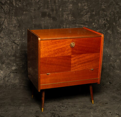old wooden furniture on a gray background