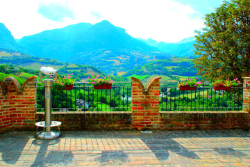 Tidy view from Montefortino at a town balcony and belvedere with brickwork merlons, metal barriers,...