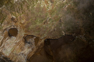 Speleology. The Bacho Kiro cave, Dryanovo, Bulgaria. Stalactite, and stalagmite speleothem formations.
