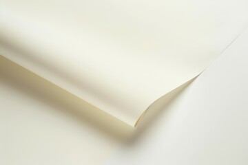 A white piece of paper with a curve in it. Background