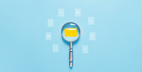 magnifying glass shows document files digital electronic, manage data, business paperless. concept...