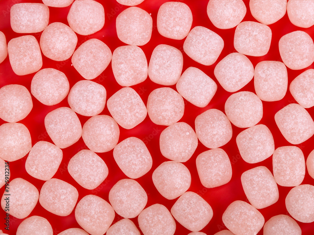 Sticker background of pink and white sugar cubes