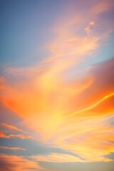 Obraz premium オレンジや青にグラデーションする夕焼けの空と太陽と雲