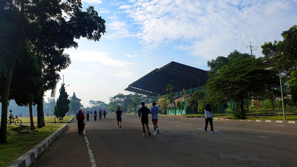 People Jogging Running Morning with blue sky cloud