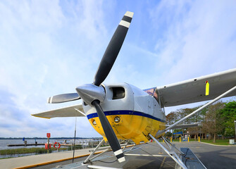 Naklejka na ściany i meble Close up of a seaplane parked and ready to takeoff.