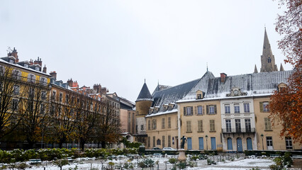 Outdoor View Of Old Buildings In Winter Season With White Snow In Jardin de Ville, France.