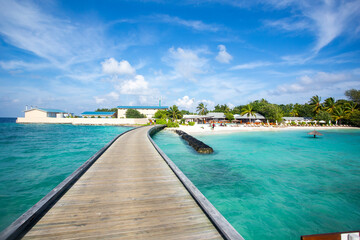 The Wooden Walking Bridge At Resort In Maldives Island. Maldives Is A Wonderful Tropical Island With White Sandy Beaches.