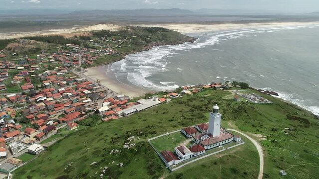 Aerial view of Santa Marta Lighthouse and Santa Marta Beach - Laguna, Santa Catarina, Brazil