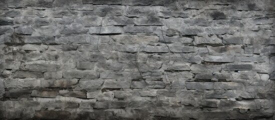 Monochrome photo of a grey brick wall with rectangle pattern