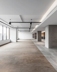 Fototapeta premium Contemporary minimalist empty room with natural lighting coming from a window. Interior design composition with copyspace in natural color.