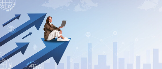 Young businesswoman with laptop sitting on arrow going up against light city background with copy space. Financial growth concept