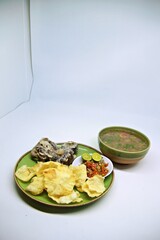 Fried Beef Oxtail with Sambal Balado. Boiled beef oxtail until tender, fried until slightly crispy and served with fresh spicy balado chili sauce.