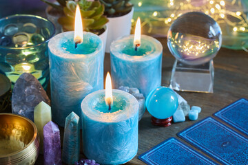 Fortune telling. Mystical Still Life with Candles, Crystals and Tarot