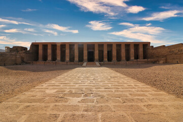 The Temple of Seti at Abydos in soft focus with blue skies built in 13th century BC by the Pharoah...