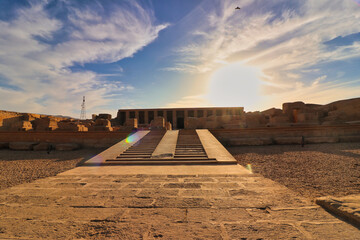 The Temple of Seti at Abydos with 42 steps leading to the entrance in the afternoon sun ,built in 13th century BC by the Pharoah Seti I near Abydos,Egypt - obrazy, fototapety, plakaty