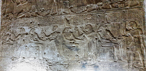 Pharoah Seti I makes offerings to different forms of God Horus in the Chapel of Horus in this...
